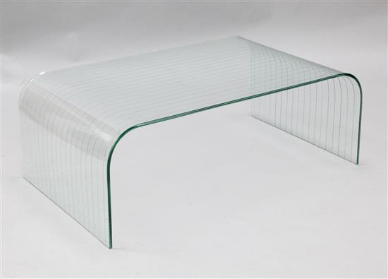 A modern grooved curved glass occasional table, W.3ft 3in. D.2ft H.1ft 2in.